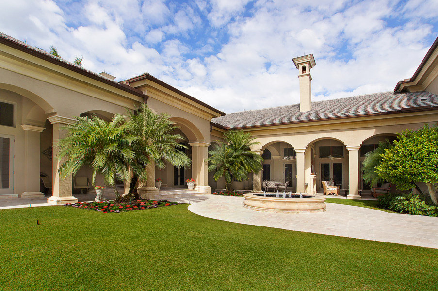 Courtyard: Fountain: Loggia with double sided fireplace